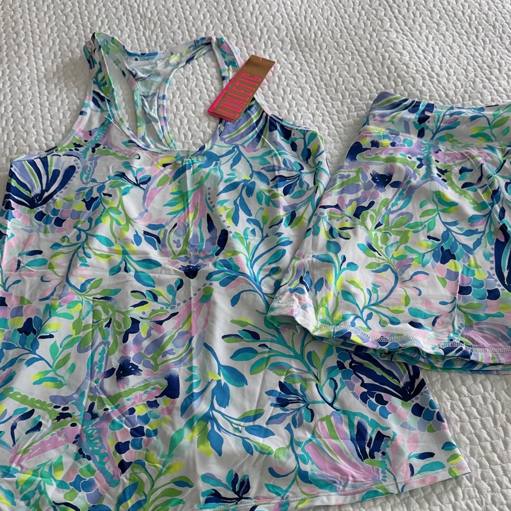 NWT Lilly Pulitzer racer back swing tank and matching skirt/skort set. Size S/M